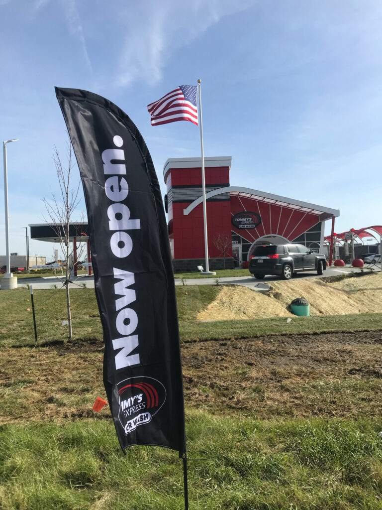 now open sign outside of Omaha Tommy's Express
