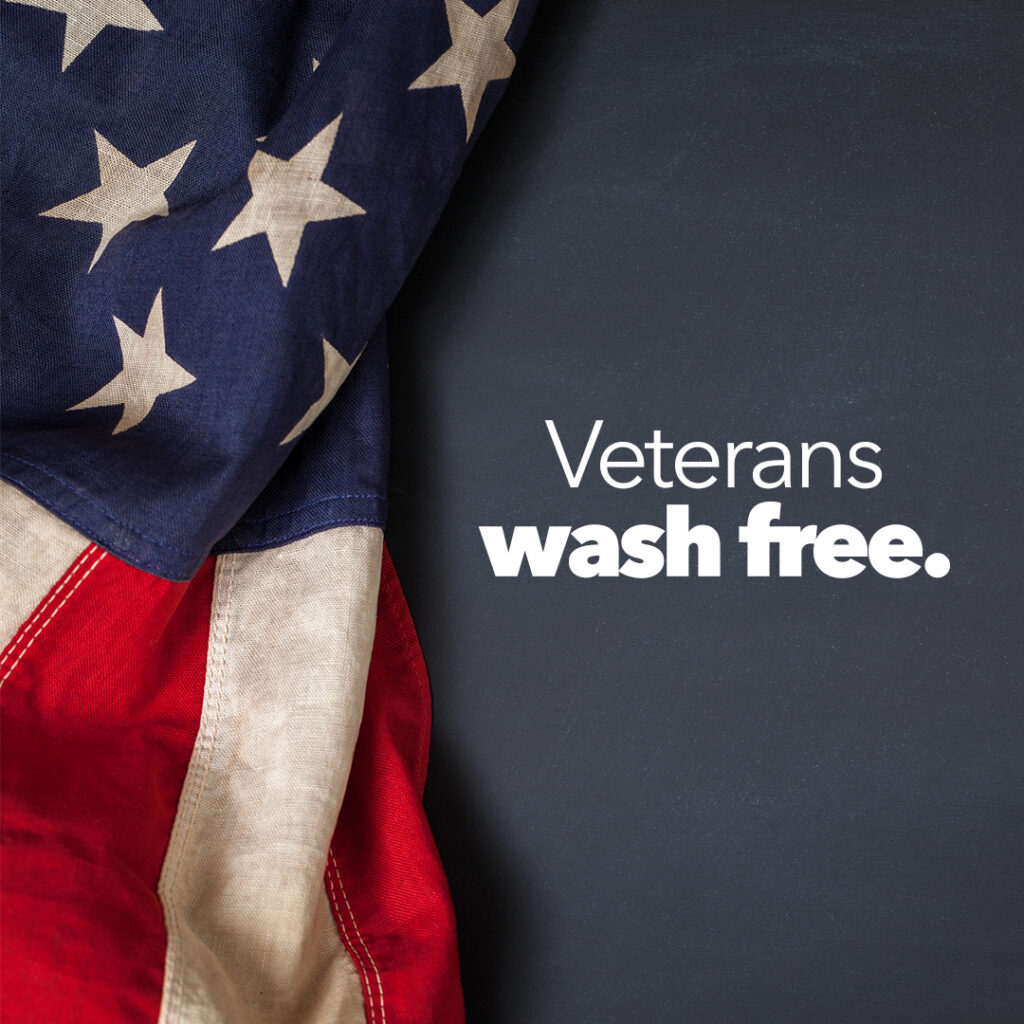 Veterans Wash free in white text next to an American flag.