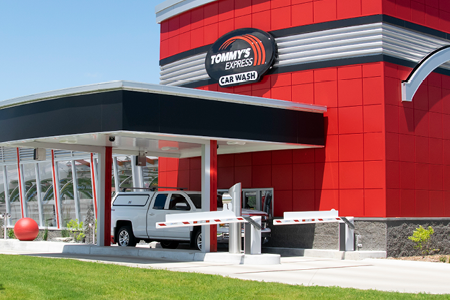 white truck in Cashier lane at Tommy's Express car wash