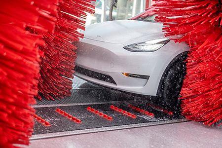 Tesla car at Tommy's Express Car Wash